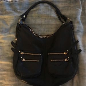 Linea Pelle black leather luxury good handbag